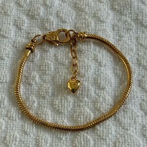 Elegant Gold Bracelet with Heart Charm. New in bag